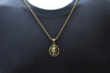 Load image into Gallery viewer, Mens Black And Gold Stainless Steel Biker Skull Pendant Necklace With 24&quot; Bead Chain - Blackjack Jewelry
